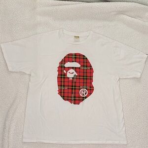 White Graphic Tee with Red Plaid Logo